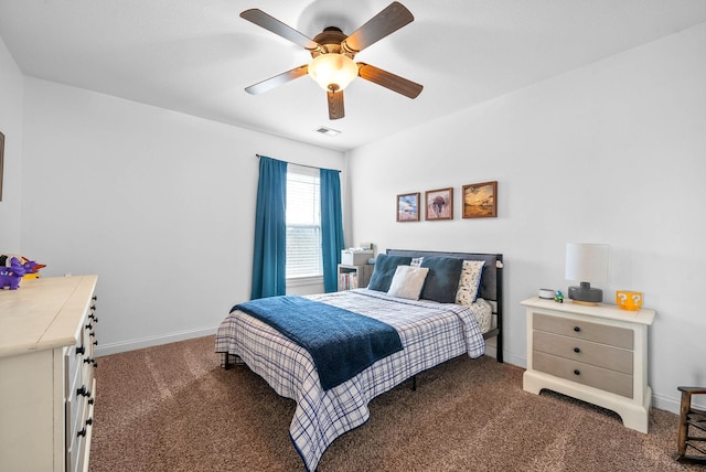 carpeted bedroom with a ceiling fan, visible vents, and baseboards