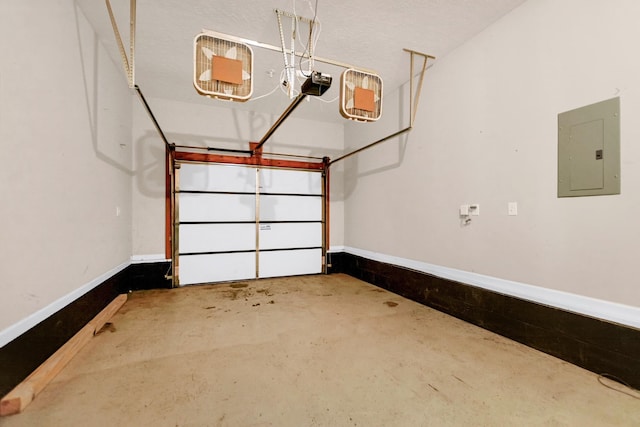 garage with baseboards, electric panel, and a garage door opener