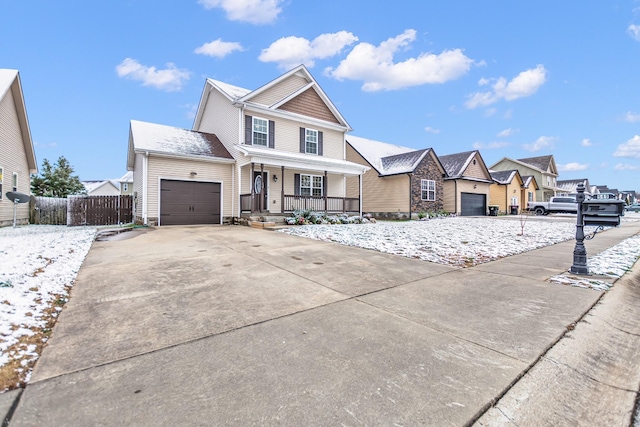 view of front of home featuring covered porch, concrete driveway, an attached garage, and fence