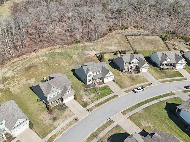 birds eye view of property with a residential view