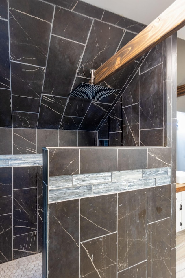 room details with a tile shower