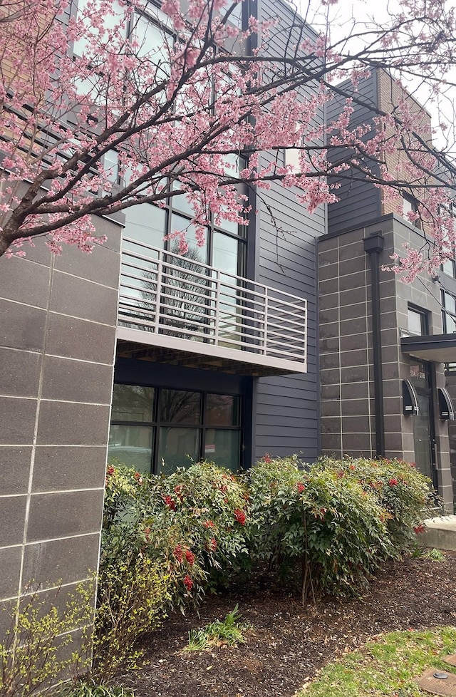 view of property exterior with a balcony