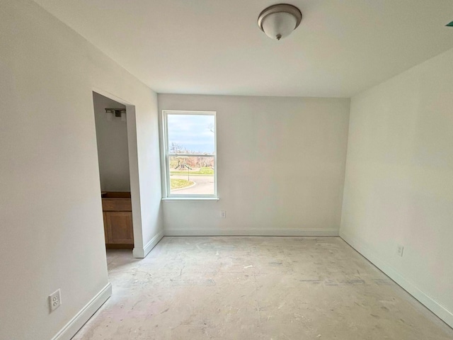 empty room with baseboards