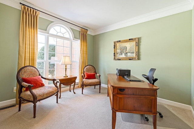 office area with ornamental molding, carpet, visible vents, and baseboards