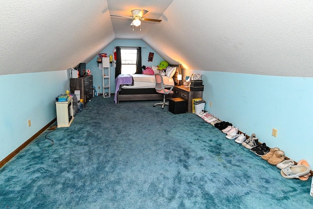 bedroom featuring baseboards, a ceiling fan, vaulted ceiling, a textured ceiling, and carpet floors