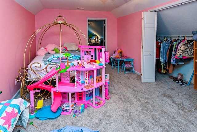 rec room with carpet flooring, vaulted ceiling, visible vents, and baseboards