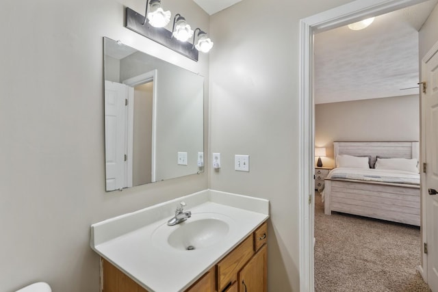 ensuite bathroom featuring vanity and ensuite bathroom