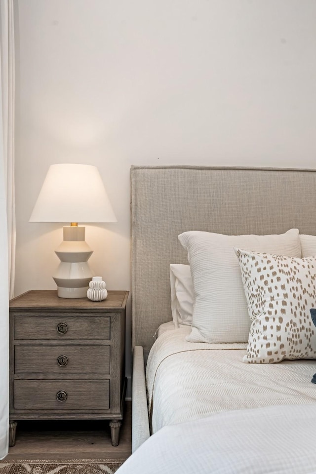 bedroom featuring wood finished floors