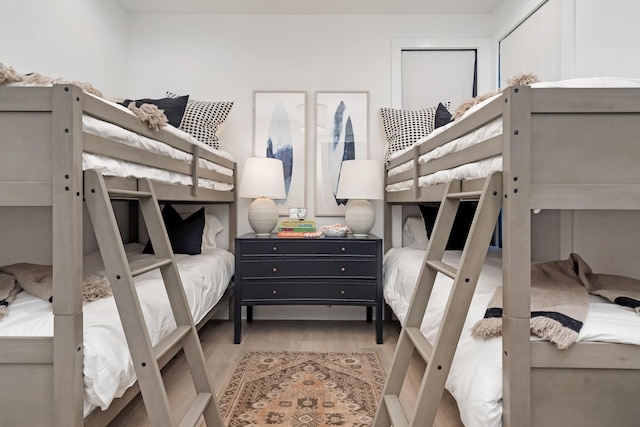 bedroom featuring wood finished floors