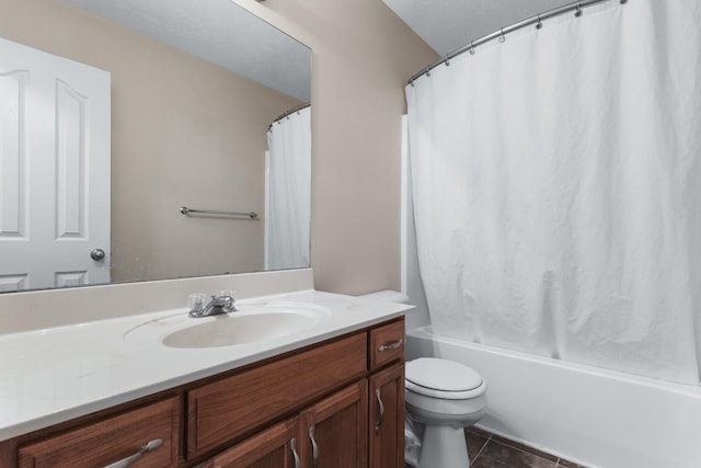 full bathroom featuring vanity, tile patterned flooring, shower / bath combo with shower curtain, a textured ceiling, and toilet