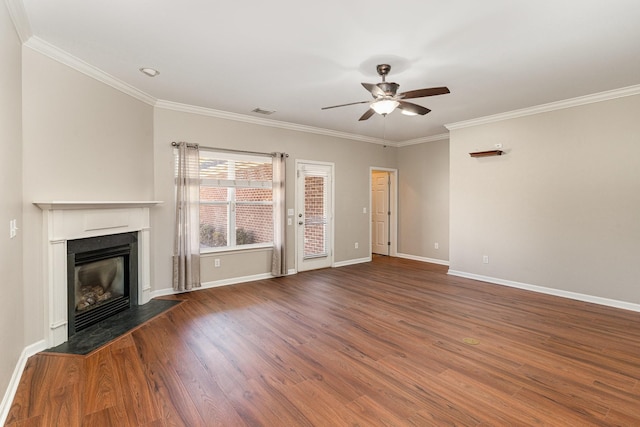 unfurnished living room featuring a fireplace with flush hearth, visible vents, wood finished floors, and ornamental molding