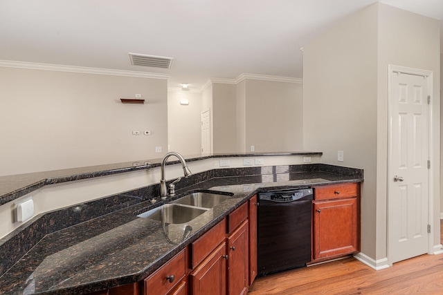 kitchen featuring black dishwasher, light wood finished floors, visible vents, ornamental molding, and a sink