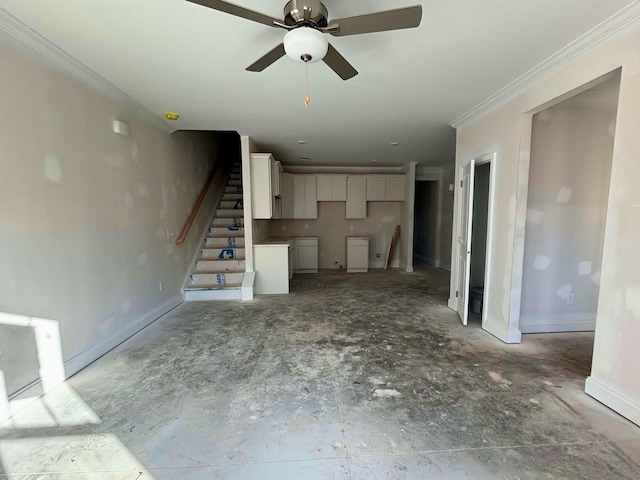 unfurnished living room featuring baseboards, stairs, ornamental molding, and ceiling fan