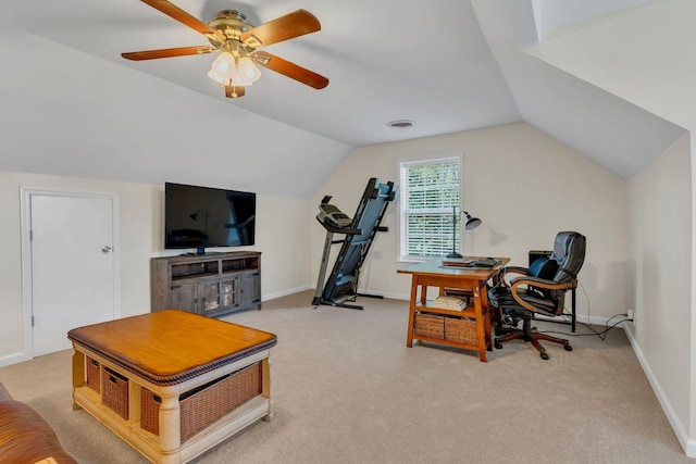 carpeted home office with lofted ceiling, visible vents, baseboards, and ceiling fan