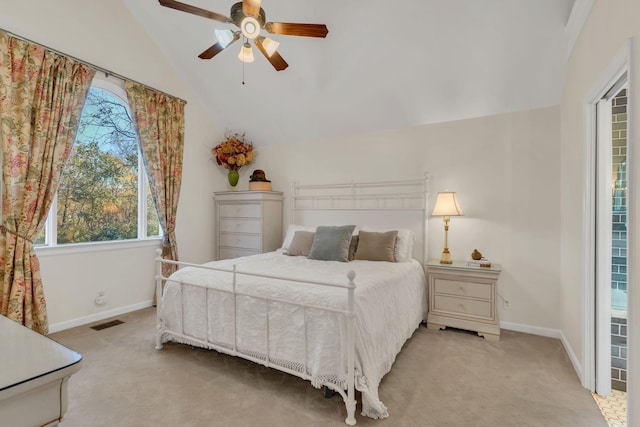 bedroom with baseboards, visible vents, vaulted ceiling, and light colored carpet