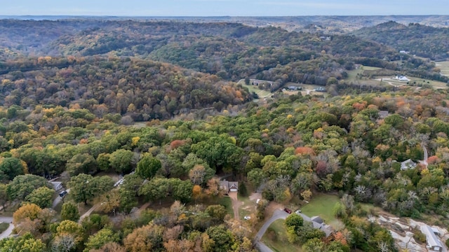 aerial view with a wooded view