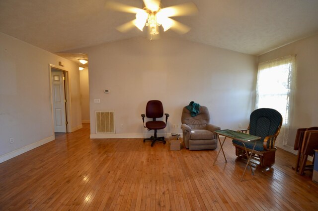 798 Buffalo Valley Rd, Cookeville, TN 38501 - living area with light wood-type flooring, baseboards, visible vents, and vaulted ceiling