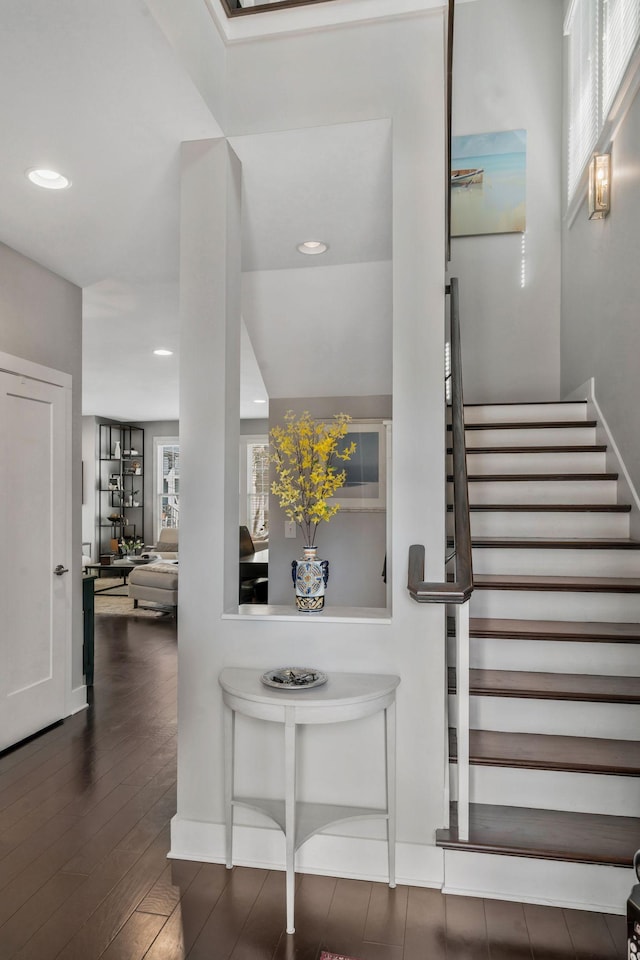 entrance foyer with recessed lighting, stairway, and wood finished floors