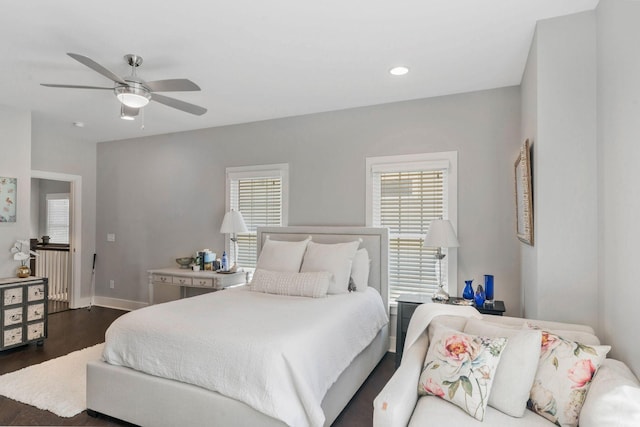 bedroom featuring a ceiling fan, baseboards, dark wood-style flooring, and recessed lighting