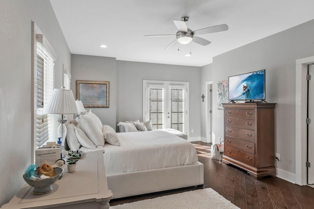 bedroom featuring ceiling fan, recessed lighting, dark wood-type flooring, baseboards, and access to exterior