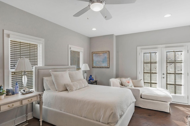 bedroom featuring french doors, dark wood-type flooring, recessed lighting, and access to exterior