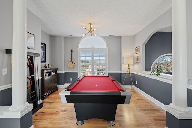 recreation room featuring light wood-style flooring, billiards, decorative columns, and baseboards