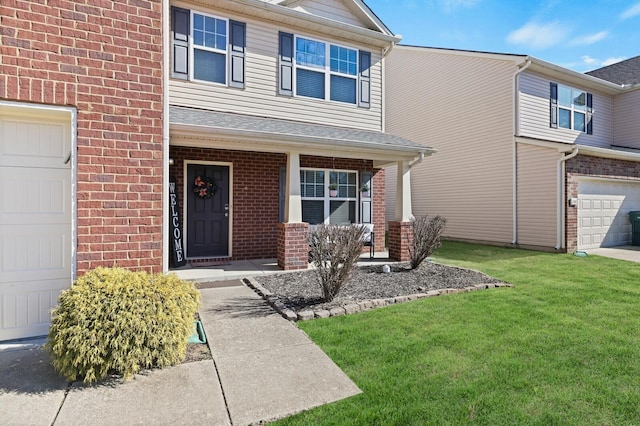 view of front of home with a front yard, brick siding, an attached garage, and roof with shingles