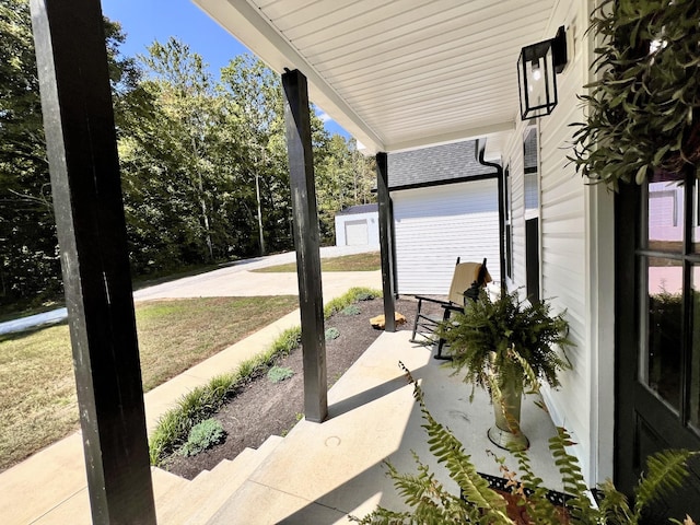 view of patio featuring a porch