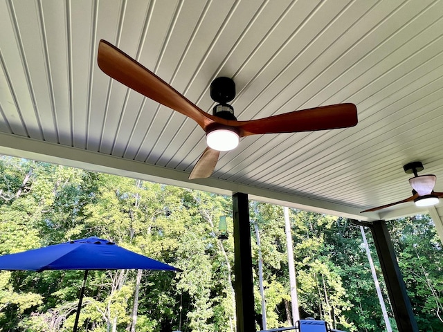 exterior details featuring ceiling fan