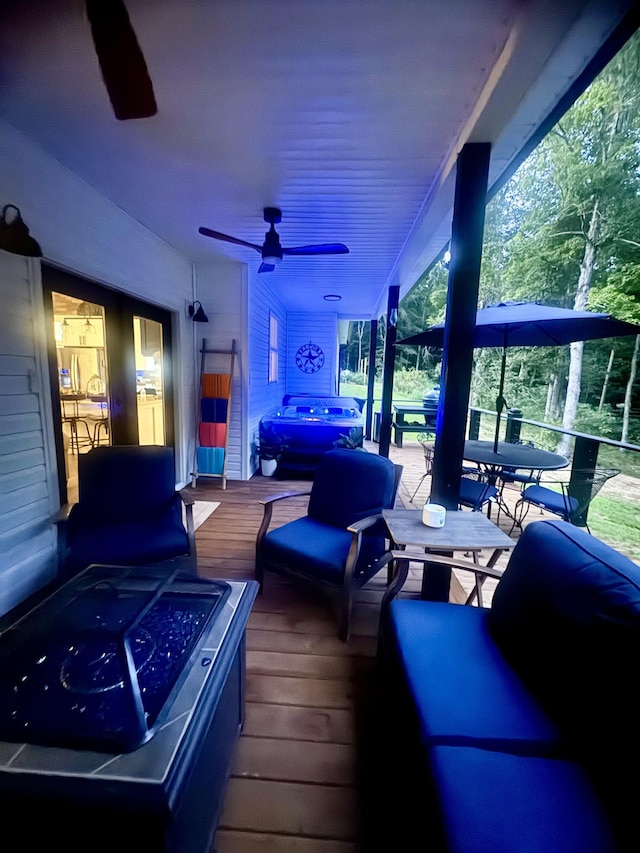 wooden terrace with ceiling fan