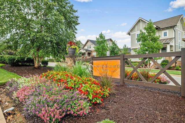 view of gate featuring fence