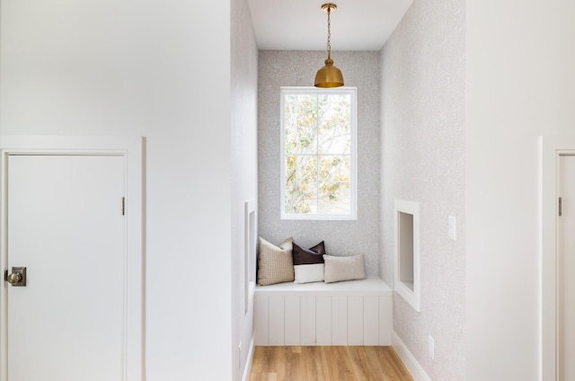 interior space with light wood-style flooring and baseboards