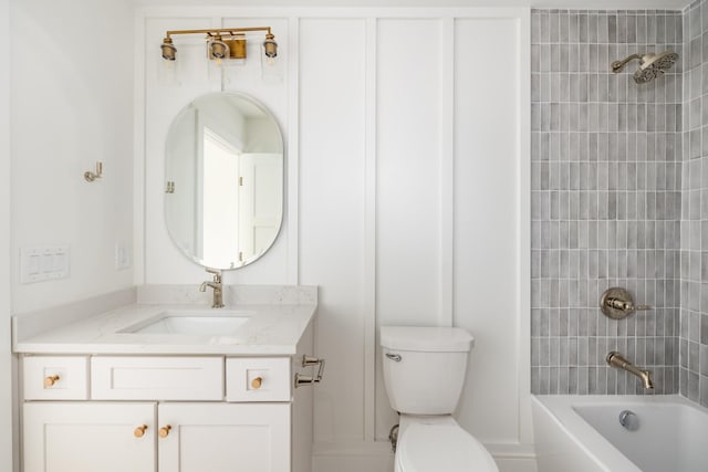 full bath with shower / washtub combination, vanity, and toilet