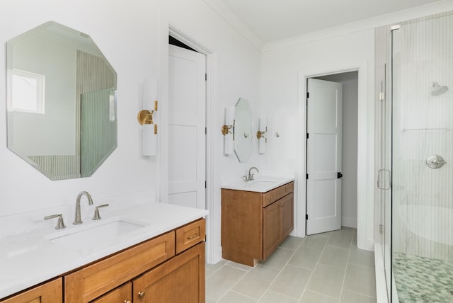 bathroom with two vanities, a sink, a shower stall, and tile patterned floors