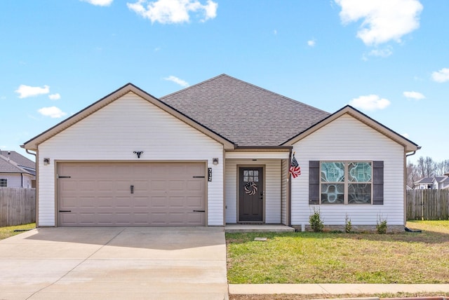 ranch-style home featuring an attached garage, a shingled roof, fence, driveway, and a front lawn