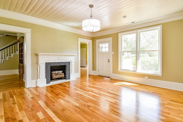 3635 Old Williamsport Rd, Williamsport, TN 38487 - unfurnished living room with light wood-style flooring, a fireplace, ornamental molding, and visible vents
