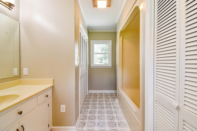 3635 Old Williamsport Rd, Williamsport, TN 38487 - bathroom with baseboards, a closet, vanity, and crown molding