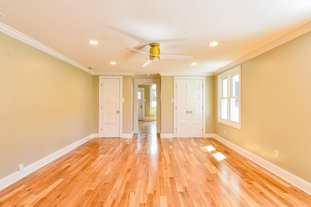 3635 Old Williamsport Rd, Williamsport, TN 38487 - unfurnished bedroom featuring light wood finished floors, baseboards, crown molding, and recessed lighting