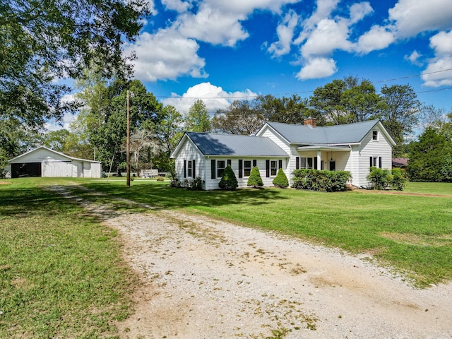 3635 Old Williamsport Rd, Williamsport, TN 38487 - ranch-style home featuring a chimney and a front yard