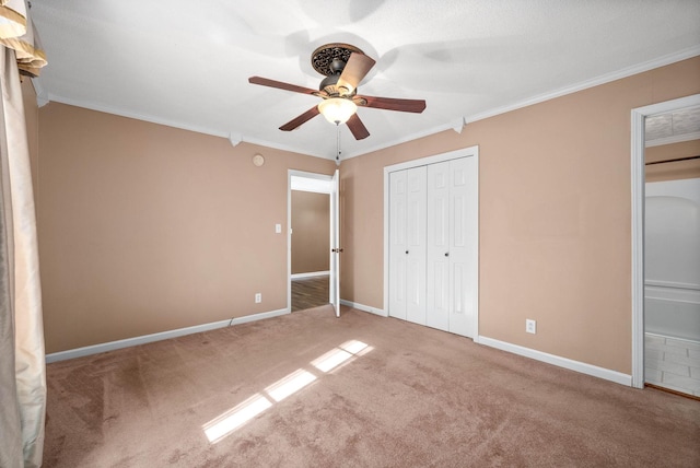 unfurnished bedroom with baseboards and ornamental molding