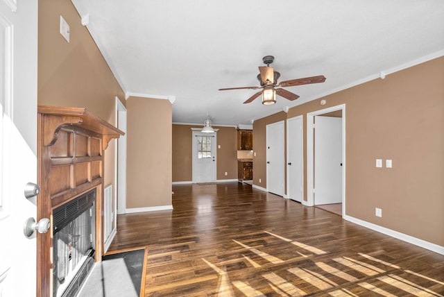 unfurnished living room featuring a fireplace with flush hearth, ceiling fan, baseboards, and wood finished floors