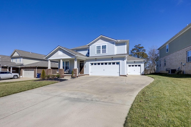 view of front facade featuring concrete driveway, an attached garage, covered porch, central air condition unit, and a front lawn