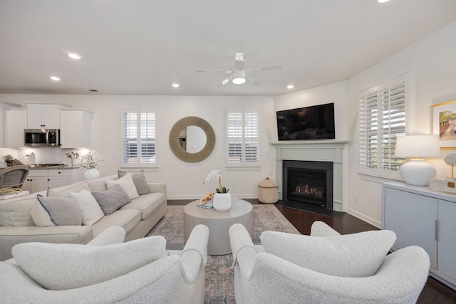 living area with a wealth of natural light and recessed lighting