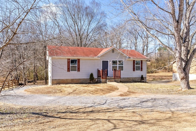 view of front of property featuring driveway