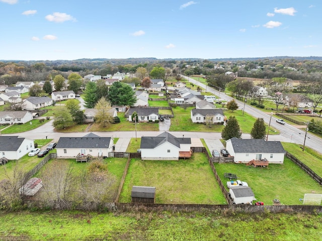 birds eye view of property with a residential view