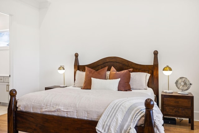 bedroom featuring wood finished floors