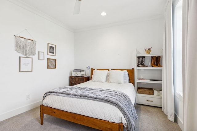 carpeted bedroom with baseboards, ornamental molding, ceiling fan, and recessed lighting