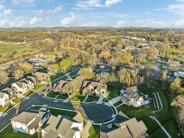 birds eye view of property with a residential view