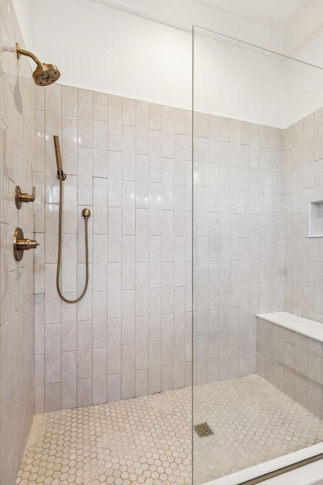 full bathroom with a tile shower