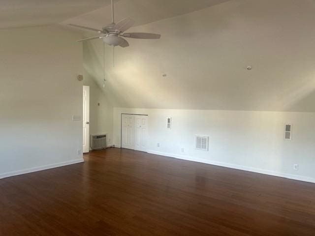 additional living space with lofted ceiling, ceiling fan, and baseboards